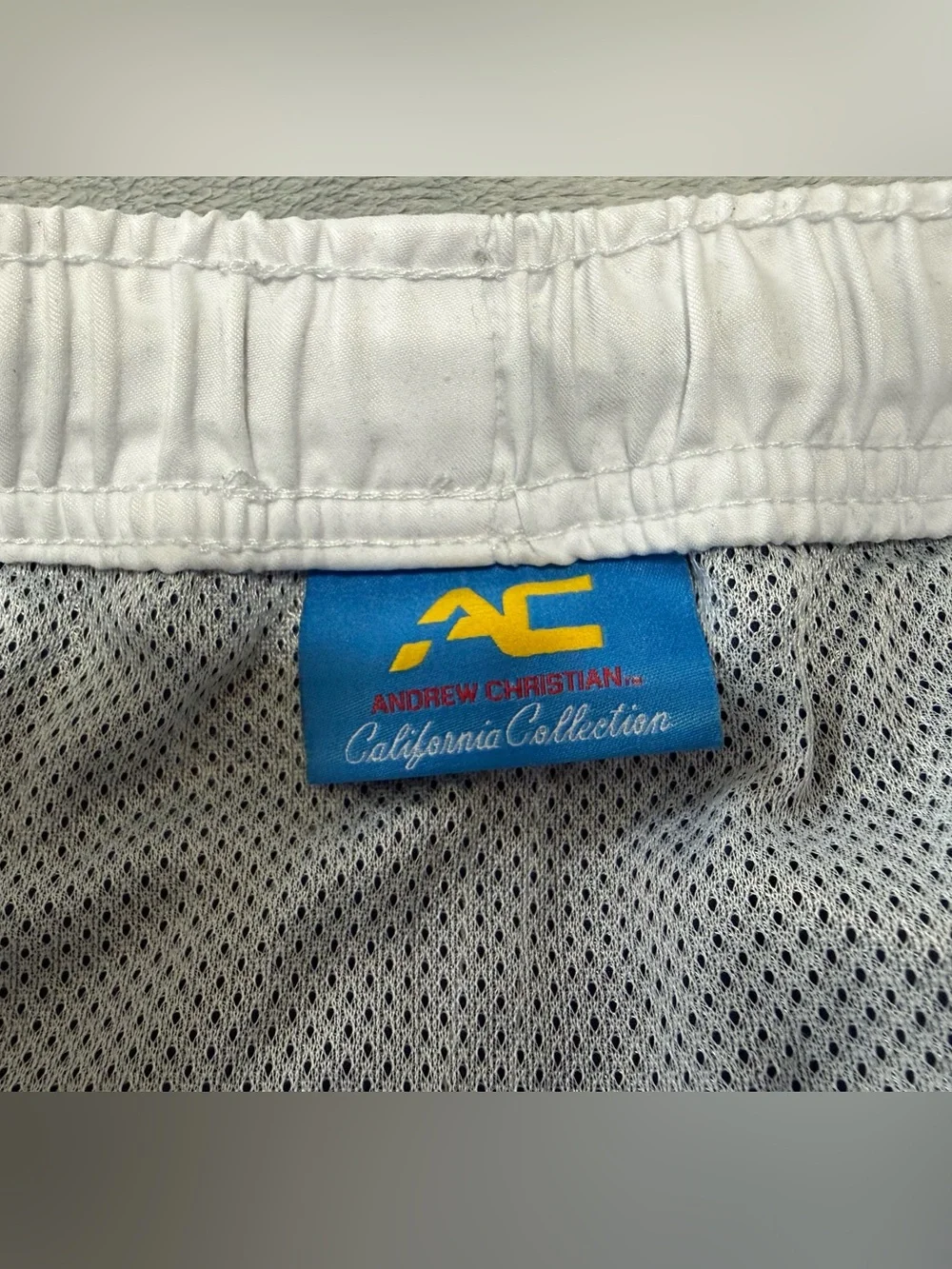 Andrew Christian lined swim trunks. They are a men’s large.